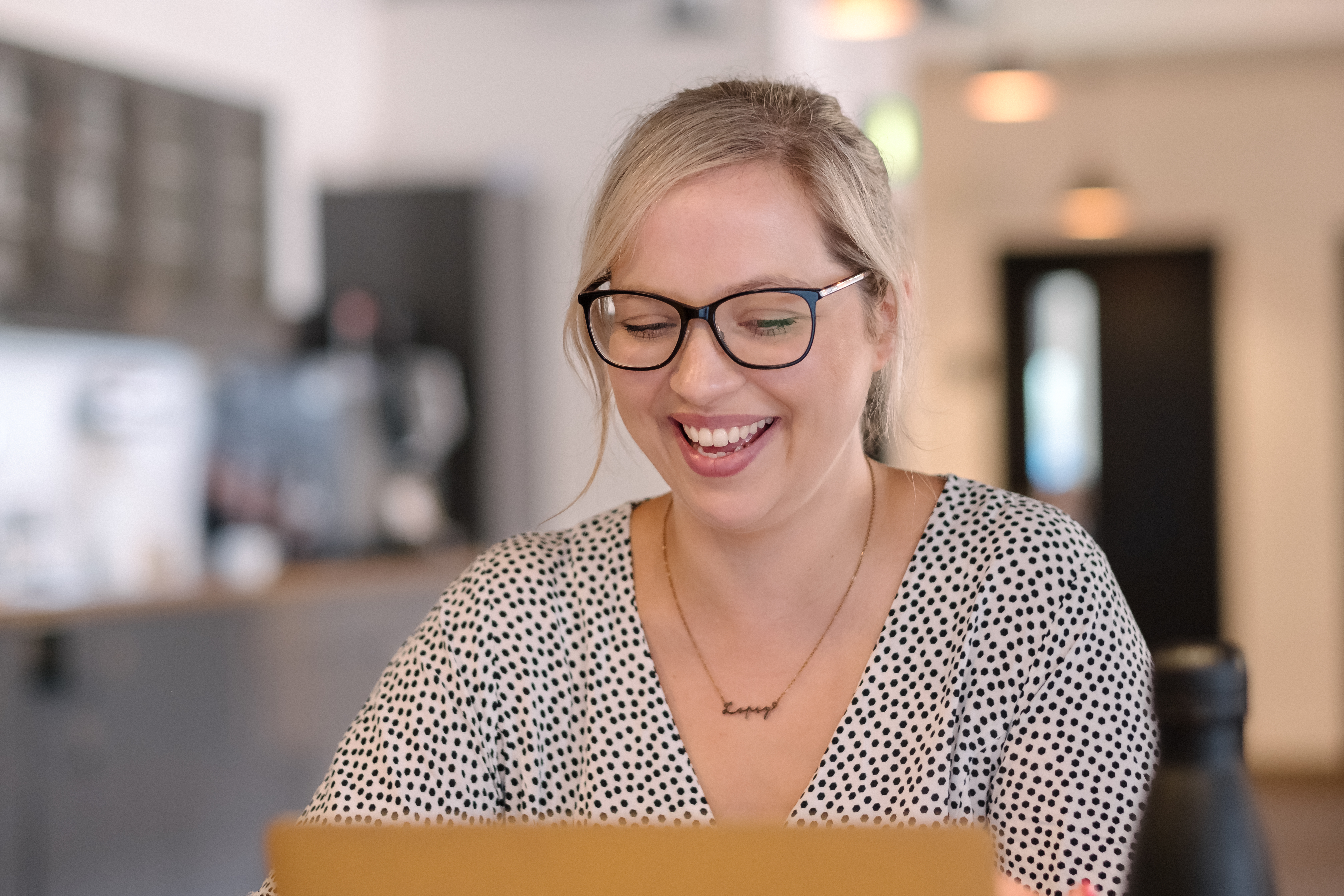 Consultant Lauren enjoys her work in the Nebula office